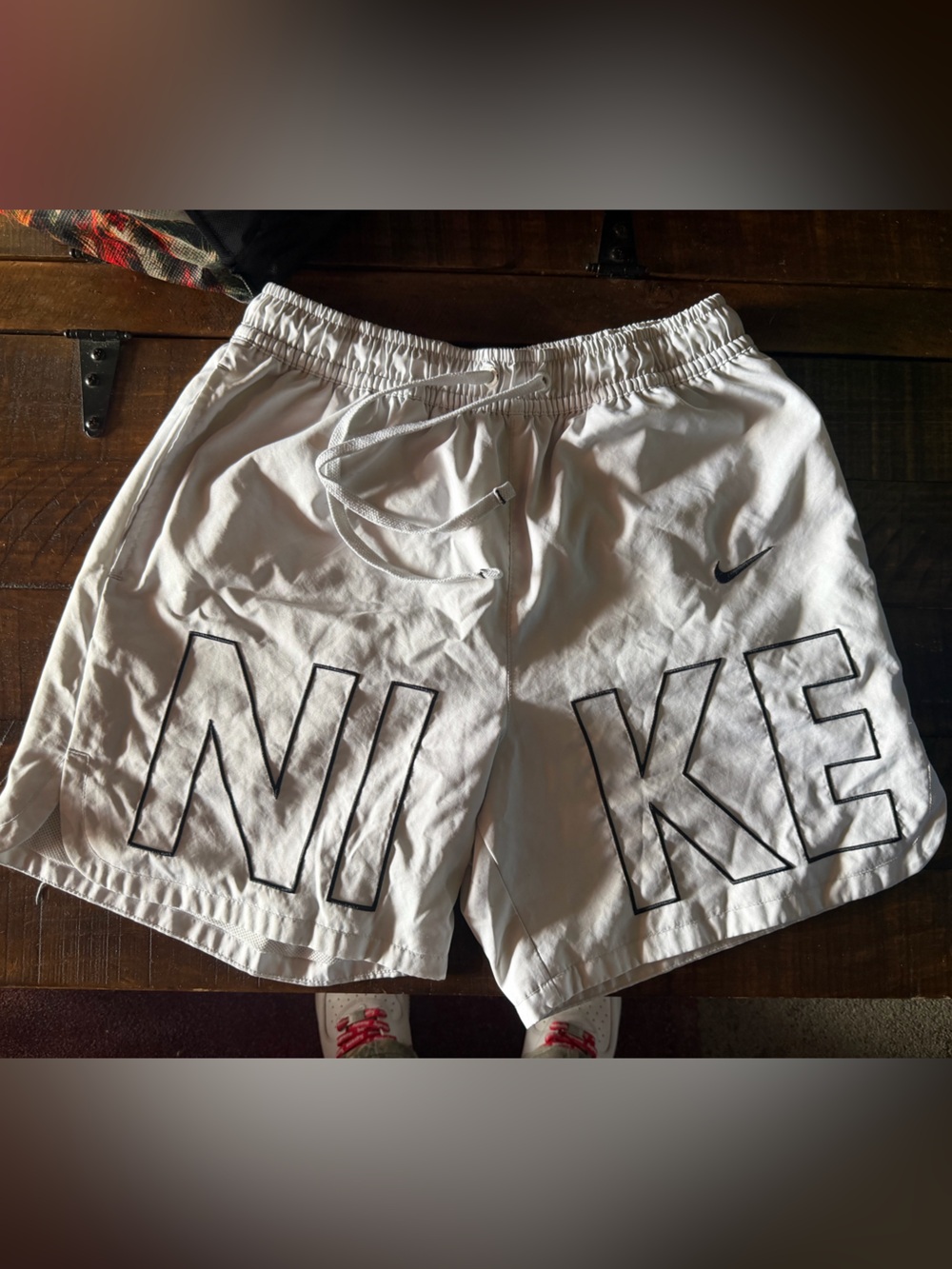 Nike Men’s White Athletic Shorts with Black Outline Logo